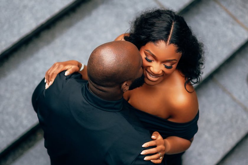 An overhead photograph of a couple holding each other